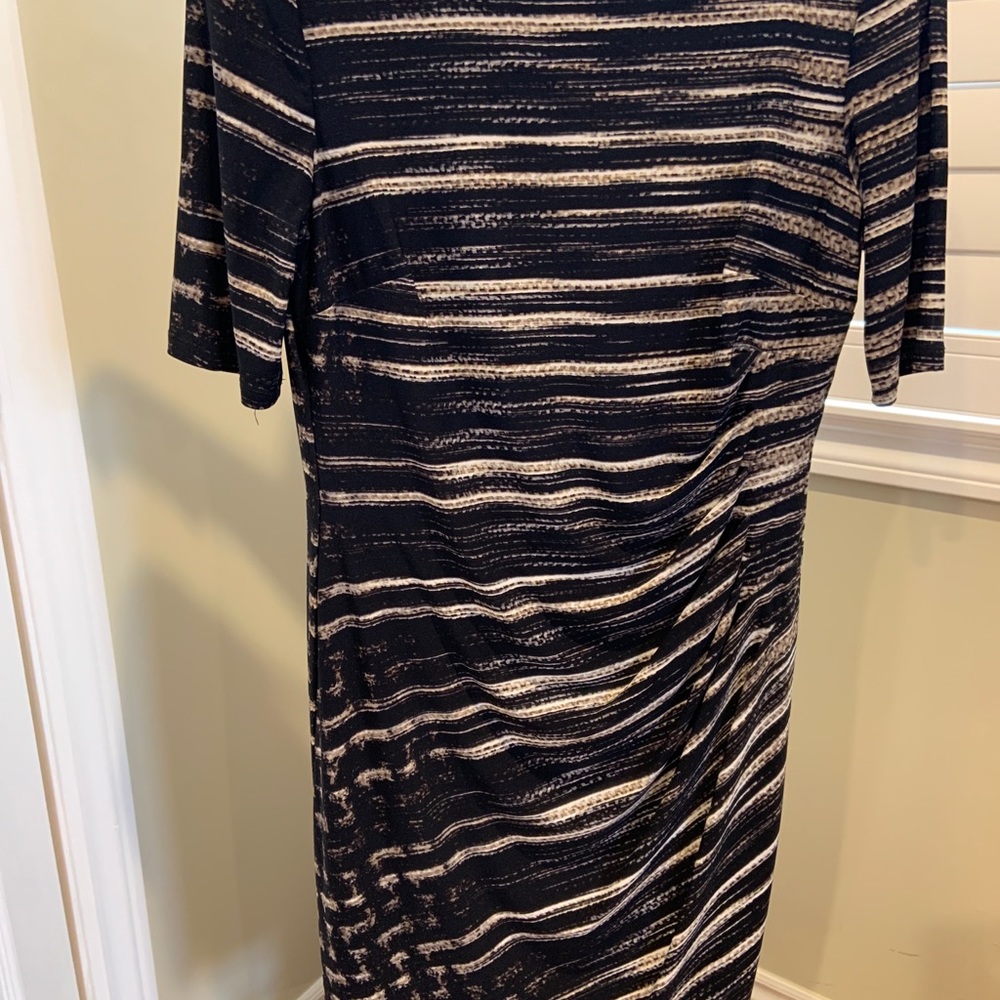 Fully lined Ann Klein dress. Polyester spandex